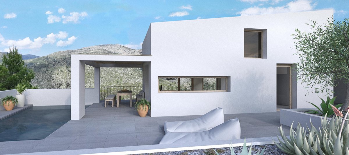 Modern white villa with pool, patio, and mountain views.