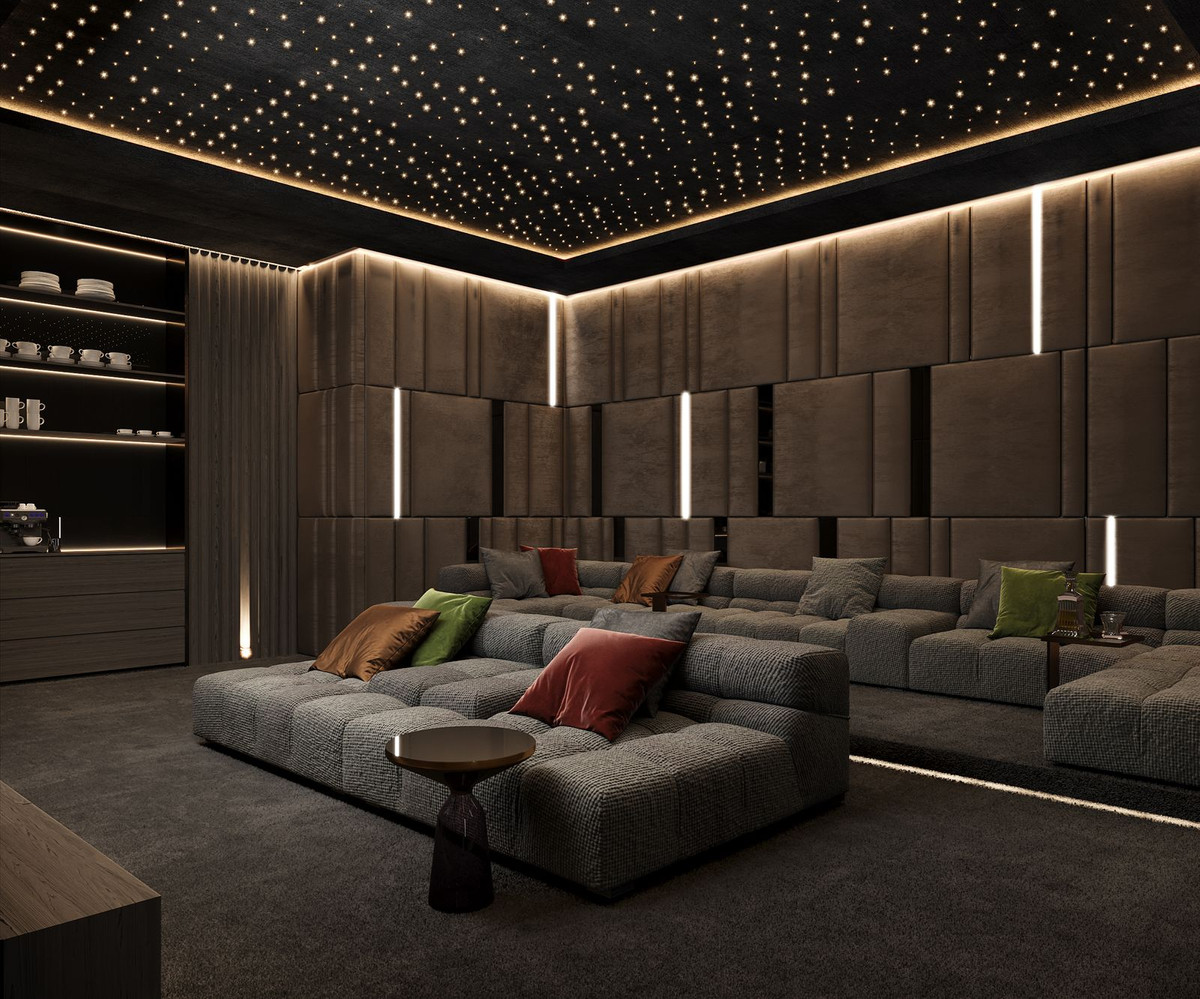 Moderne thuisbioscoop met sterrenhemel plafond en comfortabele zitplaatsen.