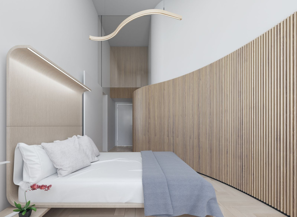 Minimalistische slaapkamer met houten wand en design verlichting.
