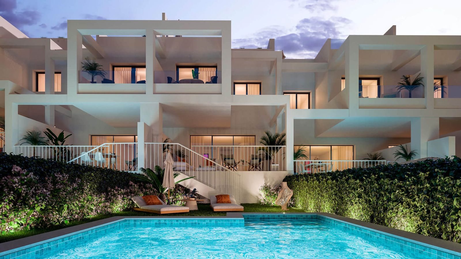 Moderne villa met zwembad bij nacht