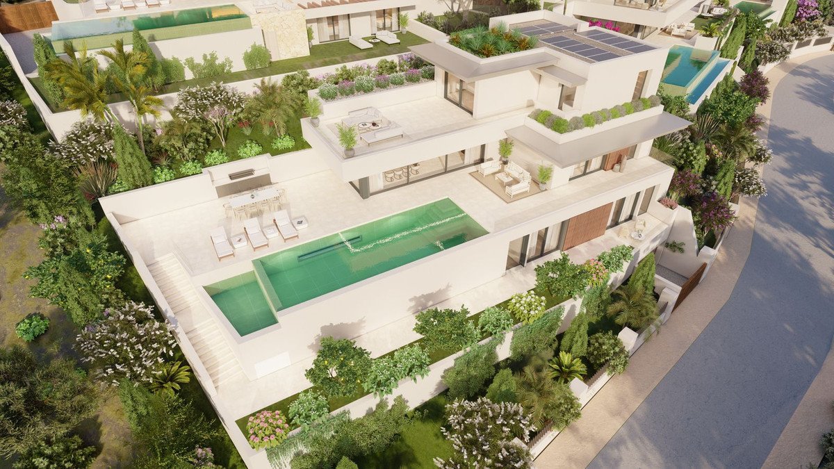 Modern luxury villa with infinity pool, outdoor dining area, multiple terraces, and lush landscaping, showcasing a high-end lifestyle.