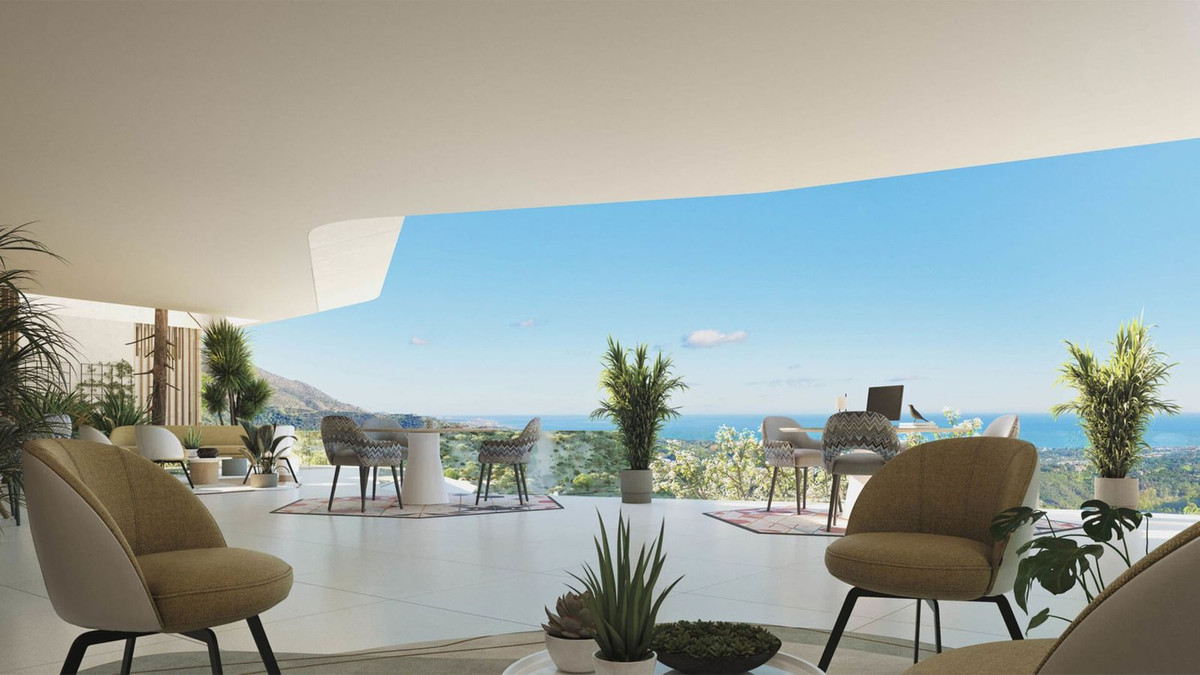 Modern terras met oceaanzicht en stoelen in Romero, Spanje.