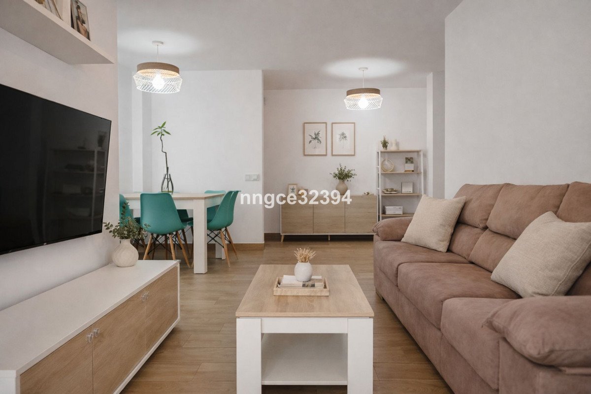 Modern living room with brown sofa, wooden coffee table, and dining area.