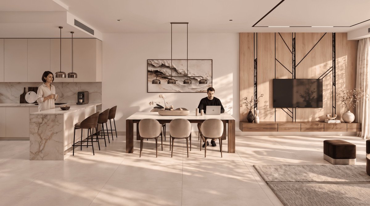 Modern open-concept living space with kitchen, dining area, and living room featuring a TV and stylish furniture.