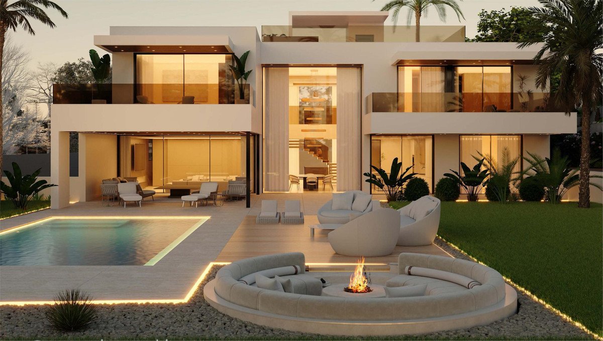 Modern mansion with a swimming pool, a fire pit lounge area, and illuminated outdoor seating, exterior view at dusk.