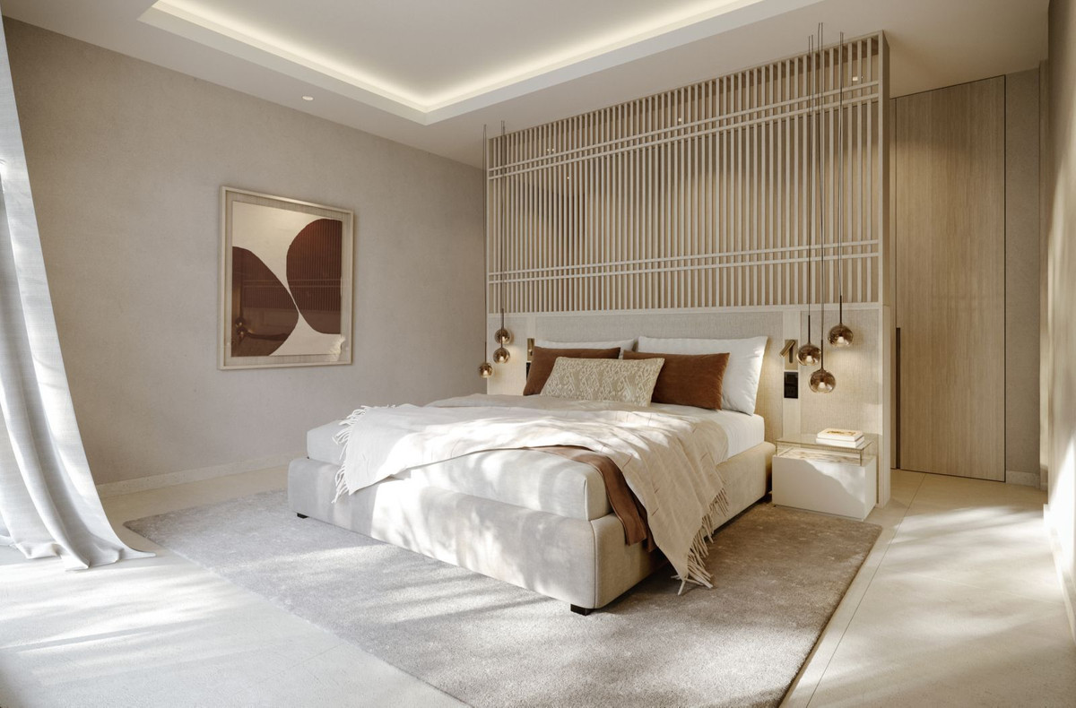 Moderne slaapkamer met beige decoratie en houten accenten.