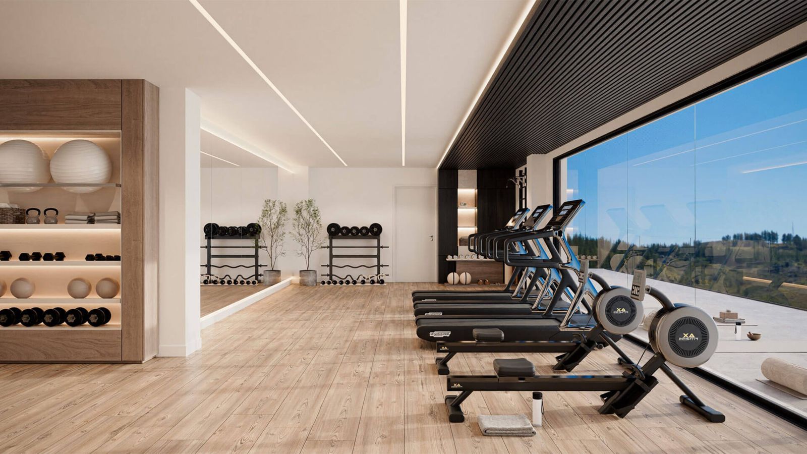 Moderne thuisgym met fitnessapparatuur en uitzicht