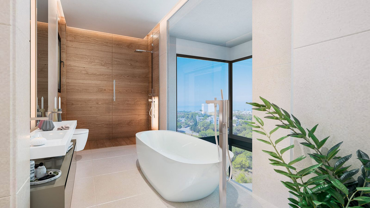 Luxe badkamer met vrijstaand bad en uitzicht bij Rio Real.