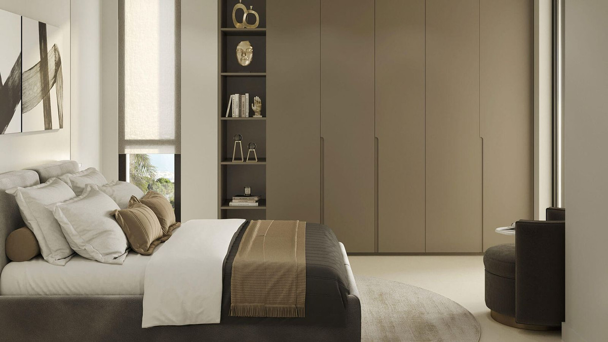 Slaapkamer met minimalistische inrichting in Sirocco Villas