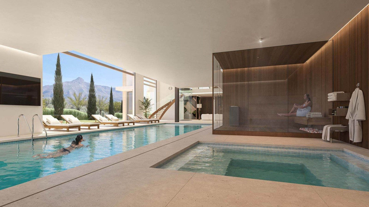 Luxe villa met overdekt zwembad, sauna en uitzicht op de bergen.