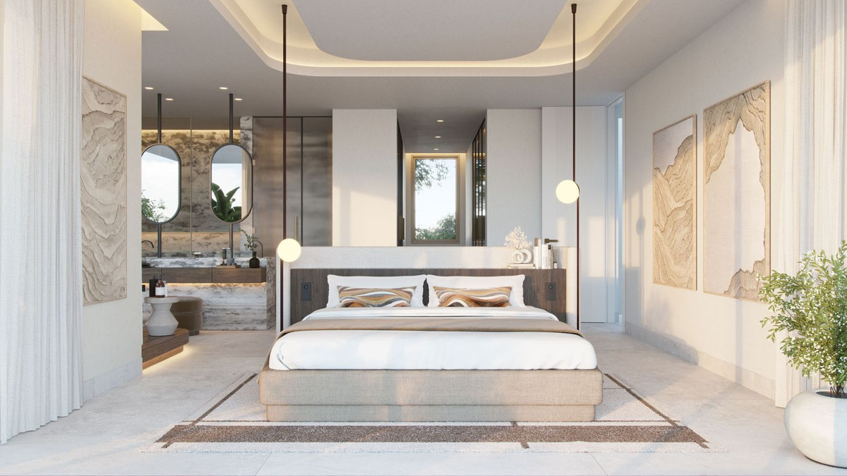 Luxe slaapkamer met en-suite badkamer en modern design.