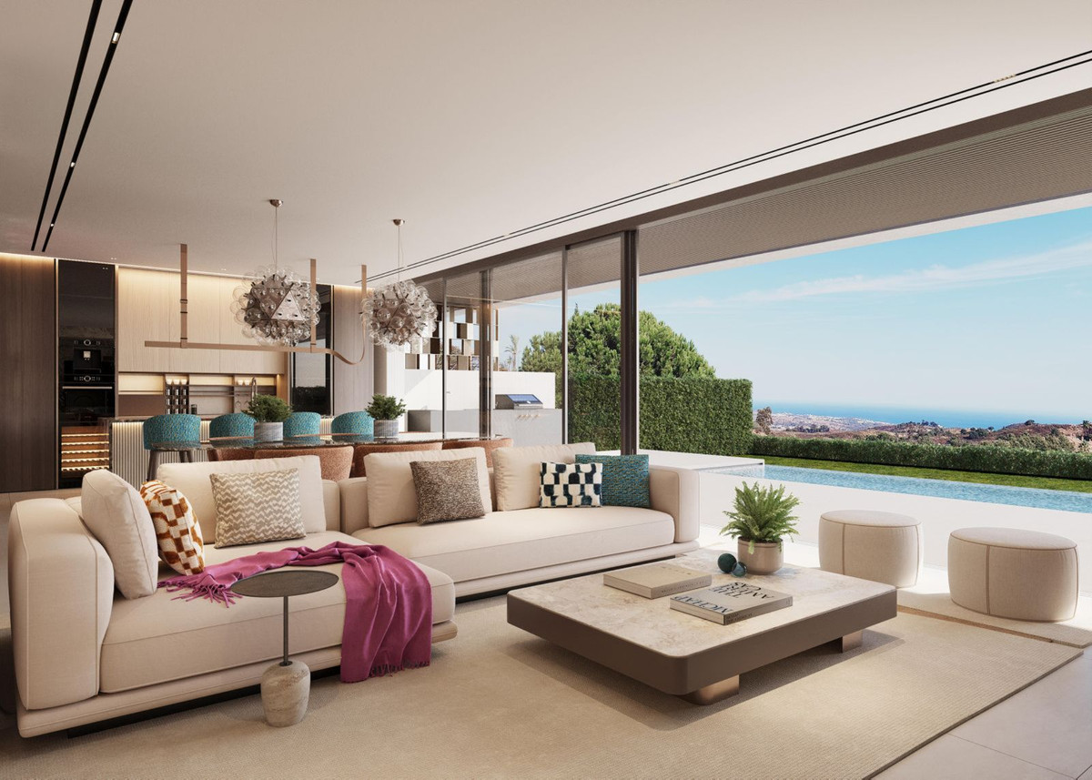 Luxe woonkamer met uitzicht op zwembad en zee in Terra Nova Hills.