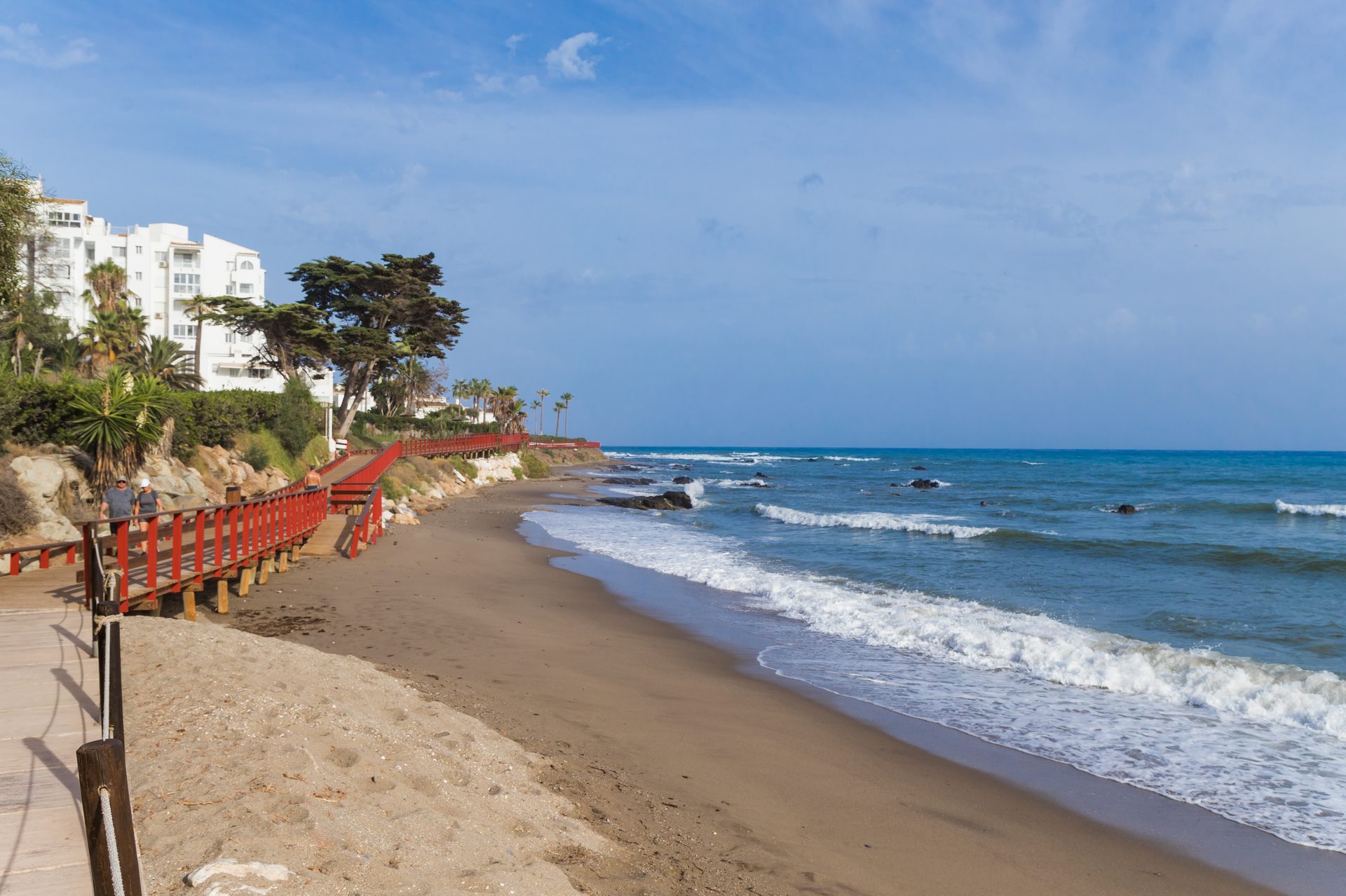 Oceanfront room with balcony, stunning beach and ocean view, modern amenities.
