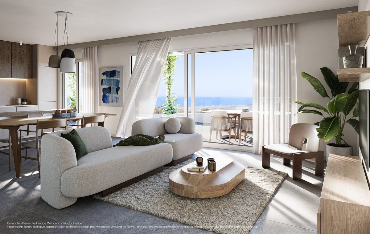 Lichte woonkamer met zeezicht in Mijas Seaviews, Spanje.