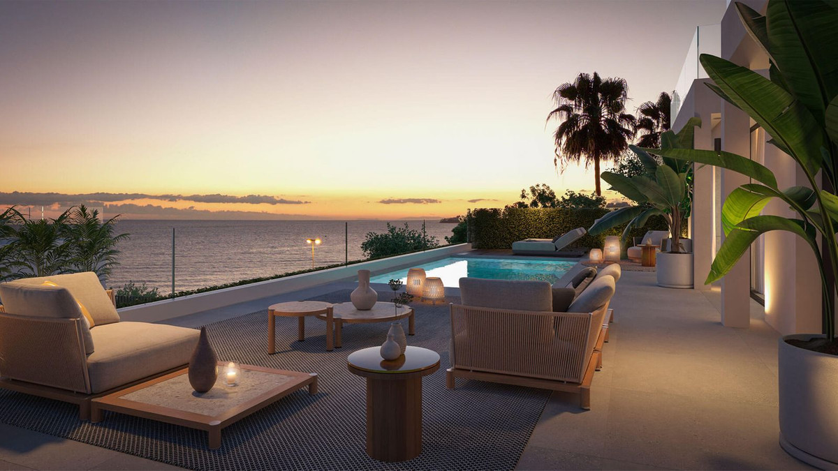 Luxe villa terras met zwembad en zonsondergang zeezicht