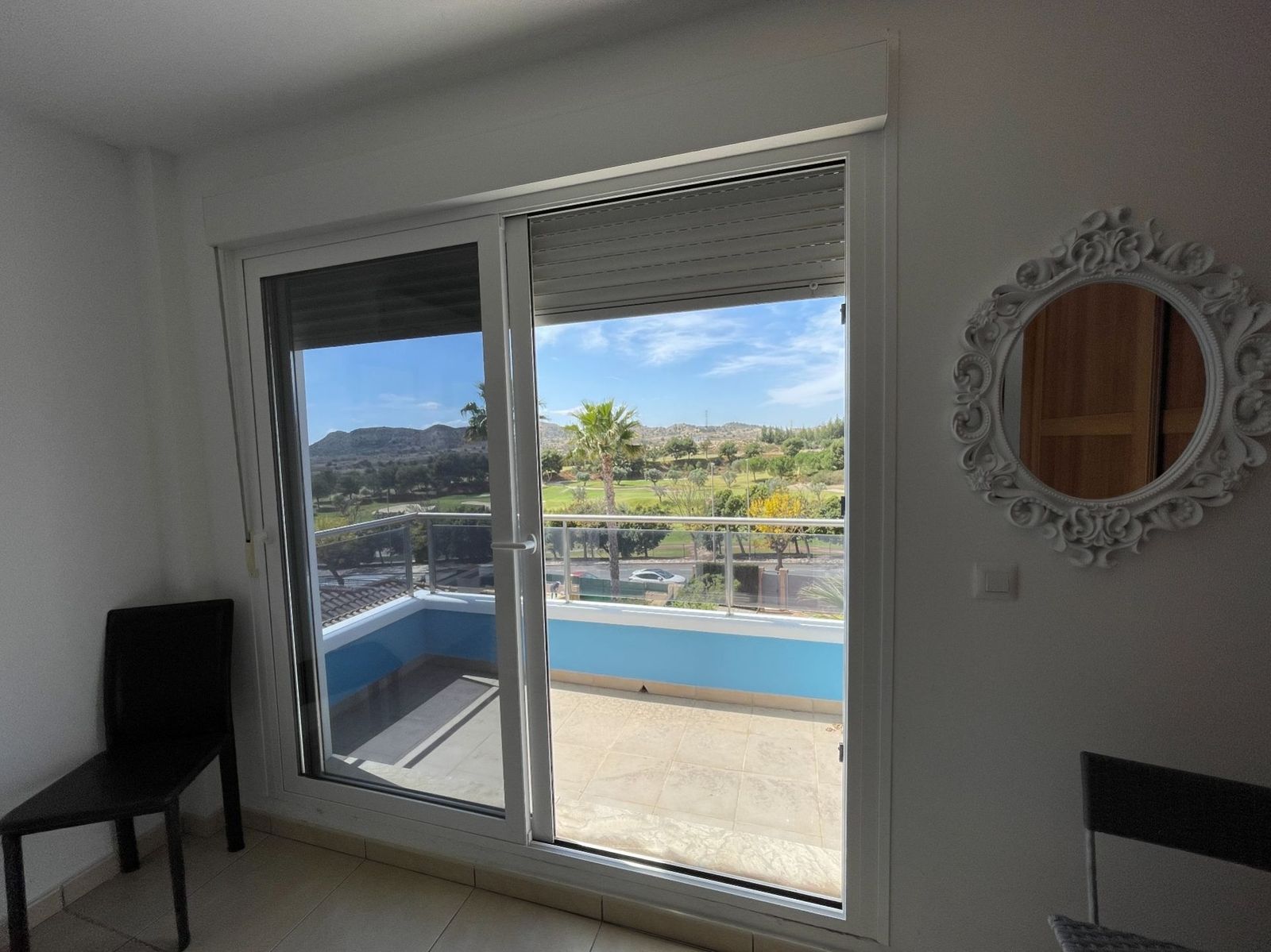 Uitzicht vanaf balkon op golfbaan