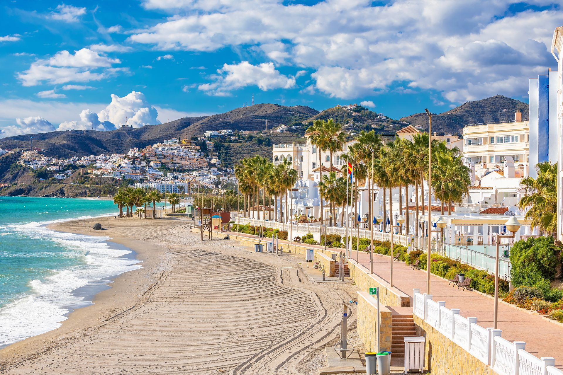 Beachfront apartment with ocean view, balcony, and modern amenities.