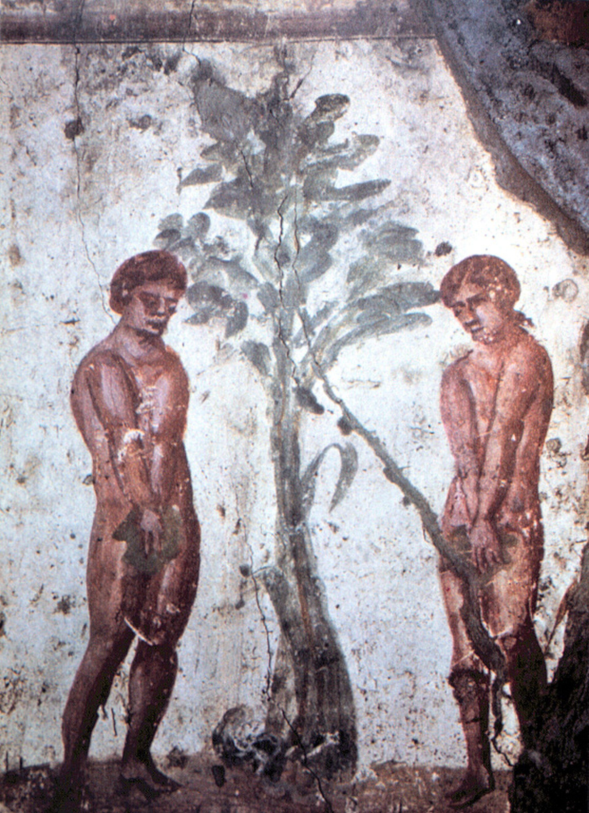 Ancient fresco depicting two figures standing beside a tree.