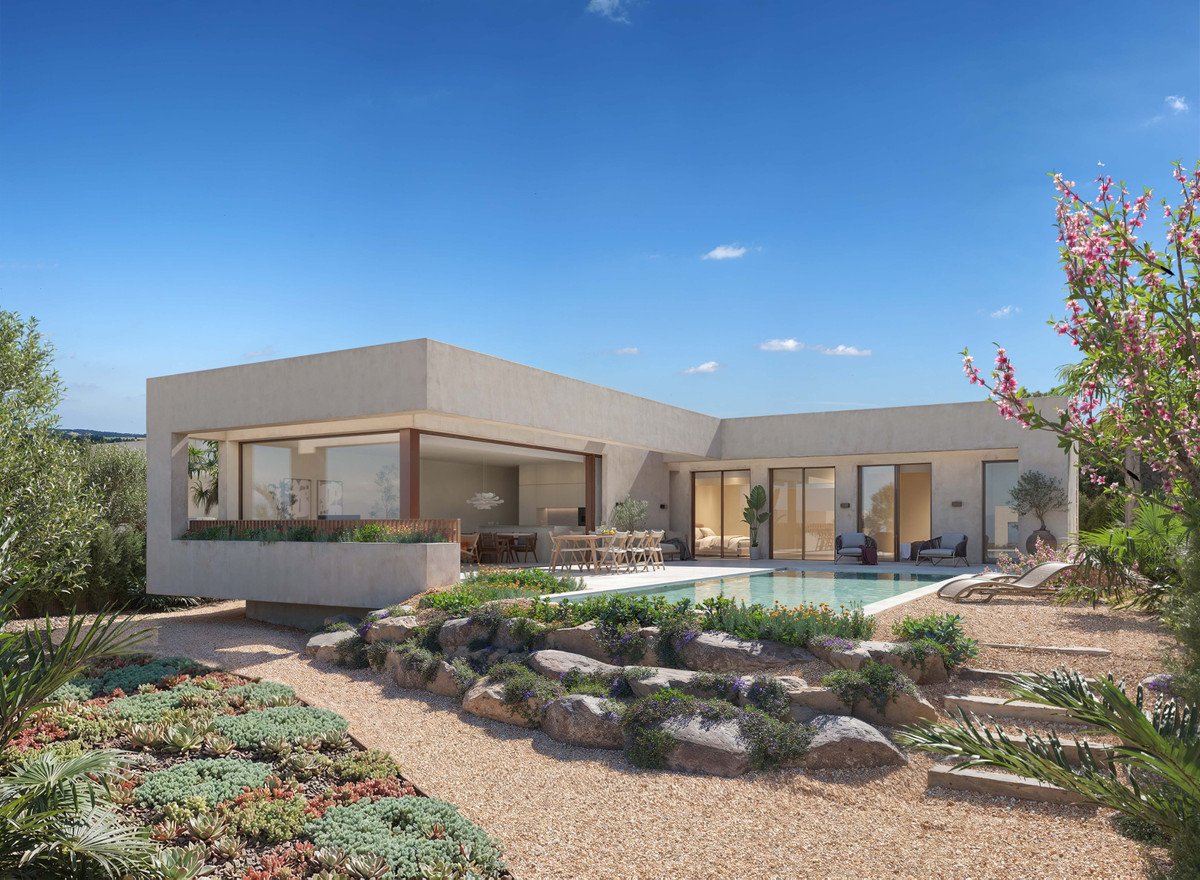 Modern villa with a swimming pool, outdoor dining area, lounge chairs, and lush landscaping under a clear blue sky.
