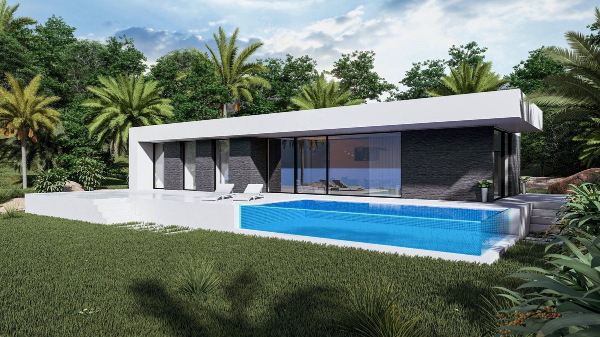 Modern villa with a pool and sea view, surrounded by lush greenery and palm trees.