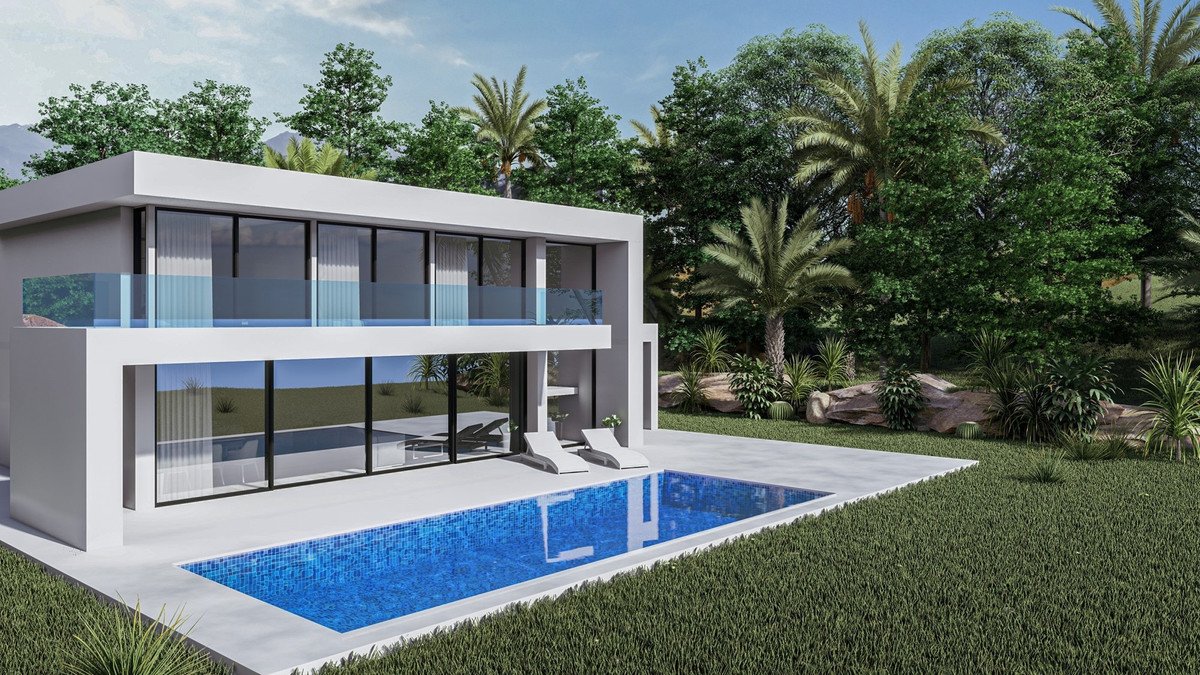 Modern two-story villa with a swimming pool and lounge chairs, surrounded by lush greenery and tropical trees.