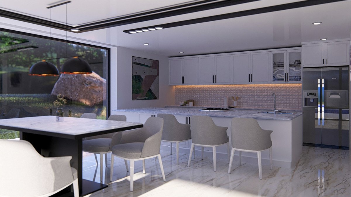 Modern kitchen and dining area with marble countertops, white cabinets, pendant lights, and a large window overlooking a garden with a rock.