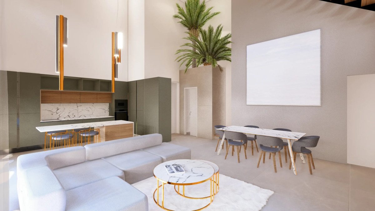 Modern open-plan living space with white sofa, marble dining table, and palm tree feature.
