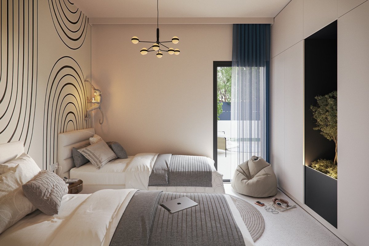 A modern bedroom with twin beds, a beanbag chair, and a balcony view with trees.