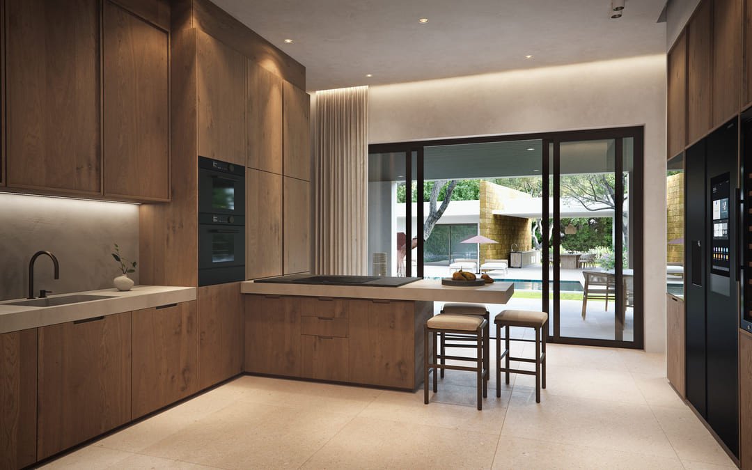 Modern wooden kitchen with a concrete island, sleek appliances, and large sliding doors revealing a backyard pool and patio area.