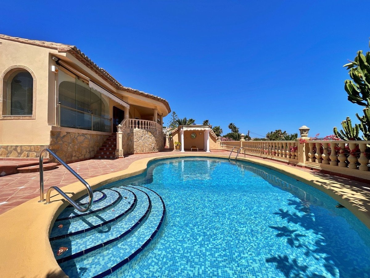 Villa with swimming pool and outdoor patio area