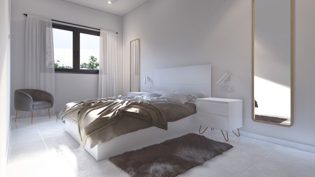 Modern bedroom with large window, white furniture, and a plush rug.