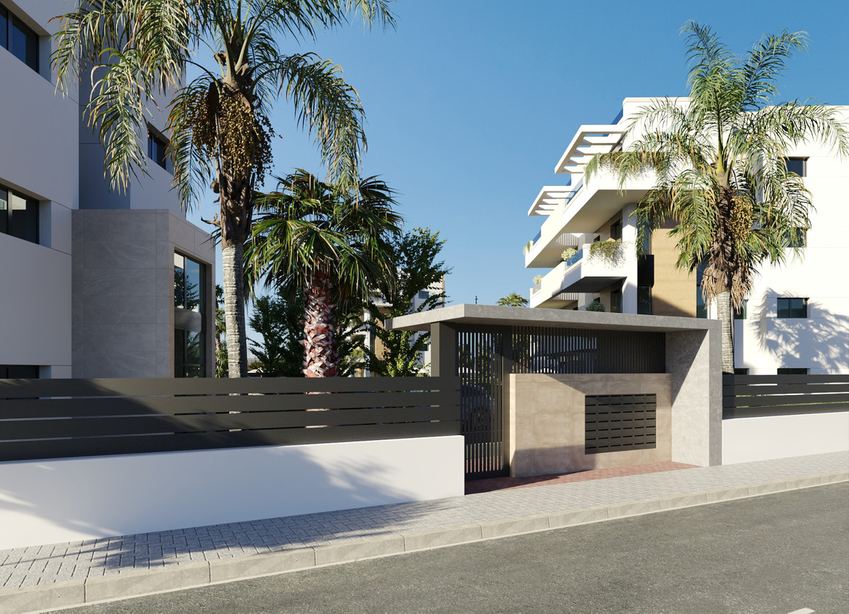 Moderne architectuur met palmbomen en strakke lijnen.